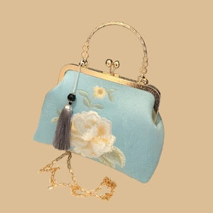 Elegant Floral Embroidered Handbag with Kiss-Lock, Tassel Detail Blue